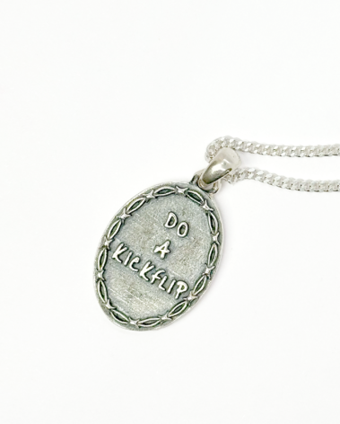 do a kickflip skate necklace